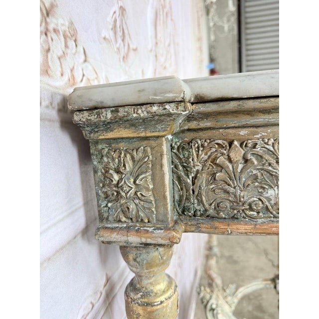 The frieze is the star: high-relief carving of a quiver of arrows crossed with a torch, tied with ribbon and surrounded by...