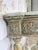 The frieze is the star: high-relief carving of a quiver of arrows crossed with a torch, tied with ribbon and surrounded by...