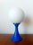 Tulip lamp, space age style, 1970s work. White plastic tulip base with flared stem. Round white opaline glass shade....