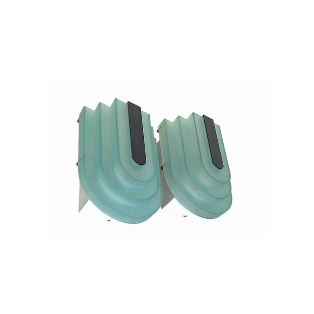 Beautifully designed in Postmodern style wall lamps by Lampatelier Herda Amsterdam from the 1980s. The holder is made of...