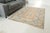 Bring an authentic and sophisticated touch to your home with this beautiful, hand-knotted vintage Turkish rug. Featuring a...