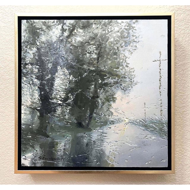 In "Spring Deluge," lush, textured strokes depict a tranquil scene of trees reflecting in still water, enveloped in a...