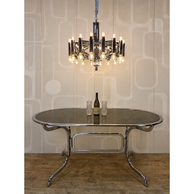 Description: a beautiful vintage / 70s design italian pendant lamp / chandelier in the style of gaetano sciolari. The lamp...