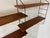 Vintage Mid Century Modernist String teak and steel wall system. You can put the shelves on différent positions. This...