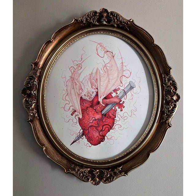 In "My Vampire Heart," a striking interplay of vivid reds and delicate line work brings to life a bat-like creature...