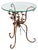 A Lovely Antique Hollywood Regency Gilt Metal Flowers Bouquet Side Table with round glass top. A total charmer. Made in...