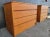 A matched pair of teak Danish Modern Dressers. Made in Denmark, circa. 1960's. Exceptional original finish and condition....