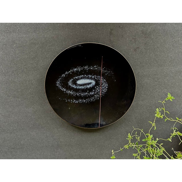 This vintage bowl is a wonderful example of mid-century modern copper enamel work as well as an interesting relic from the...
