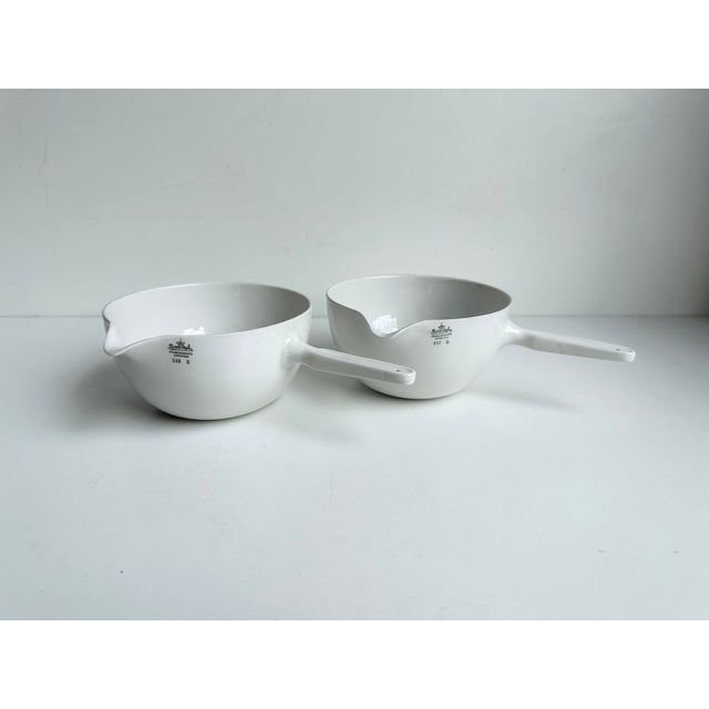 A pair of historic laboratory vessels made of high-fired, technical hard-paste porcelain by Rosenthal (Germania product...