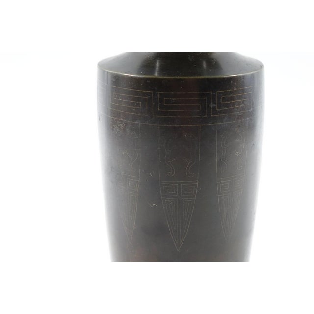 Antique Far East Bronze Vase - 4” x 4” x 11” Elevate your space with this striking antique bronze vase, a classic example...
