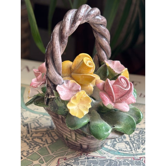 Pretty Italian Capodimonte porcelain bouquet in a basket. A petite flower arrangement which will never fade. Please see...