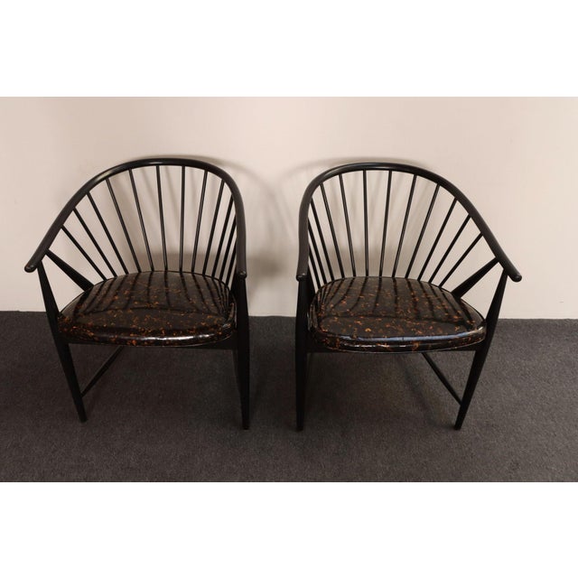 Pair of ebonized beechwood “Solfjädern” (Sunfeather) lounge chairs designed by Sonna Rosén in 1948 for Nässjö Stolfabrik,...