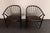 Pair of ebonized beechwood “Solfjädern” (Sunfeather) lounge chairs designed by Sonna Rosén in 1948 for Nässjö Stolfabrik,...