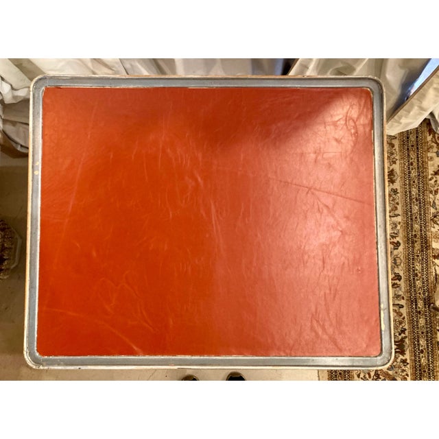 Is it a desk? Is it a side table? Is it a game table? You decide! In any case, this lovely period Louis XV table is...