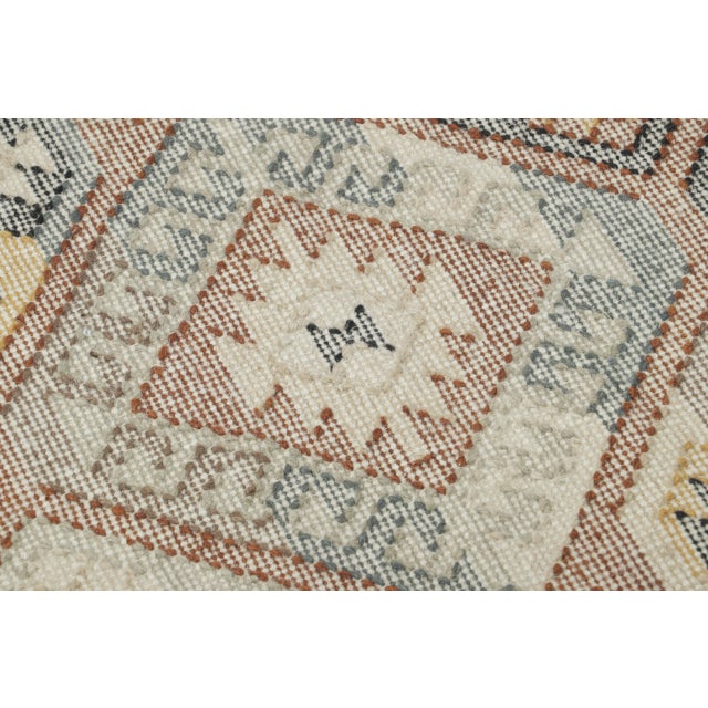 Hand-knotted in wool as a gift-sized rug, this 2x3 contemporary geometric rug joins Rug & Kilim’s Modern Classics...