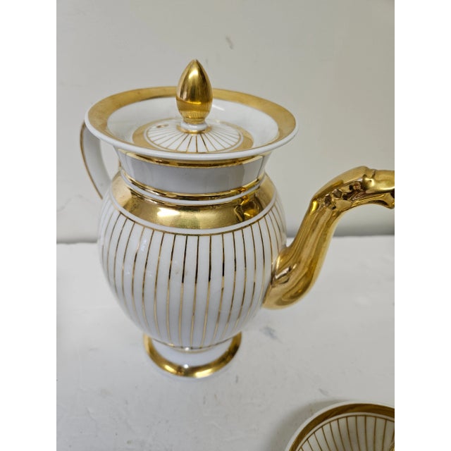 Beautiful Early 19th Century Old Paris Coffee Pot with 4 cups and Saucers. Very bright gold on white porcelain, excellent,...