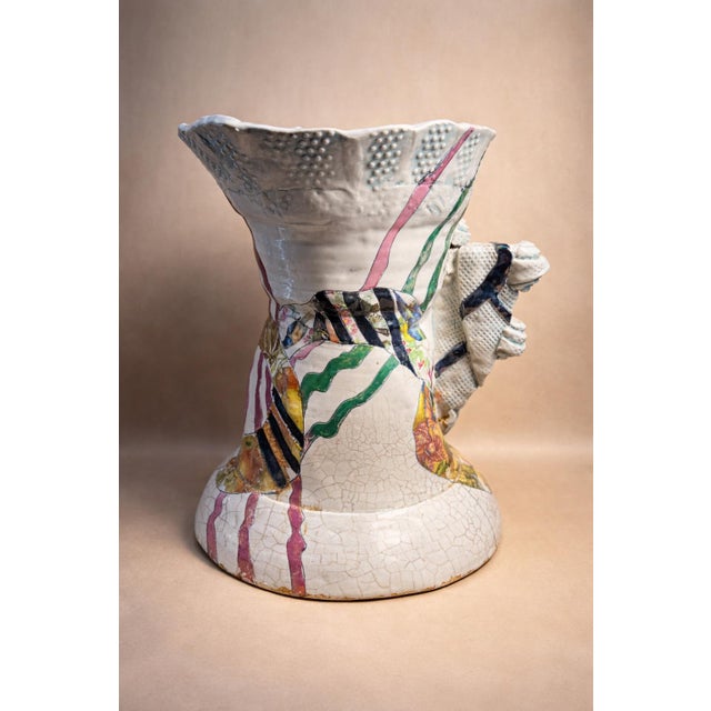 This compelling late 20th-century studio ceramic vessel pair exemplifies the expressive freedom and material...