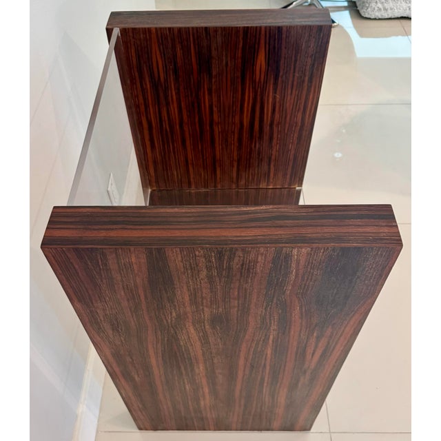 Studio Crafted Art Deco style Macassar Ebony end tables that featured an striking minimalist design. The bold, vertical...
