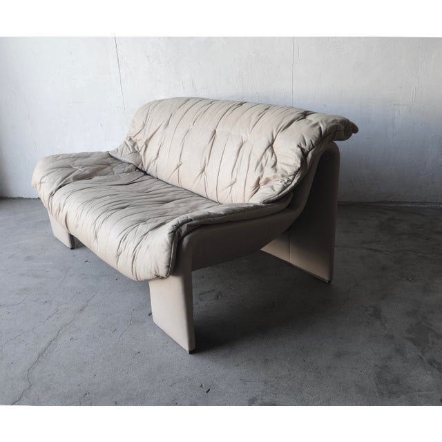 Gorgeous post modern leather loveseat by Hans Eichenberger for Intertine, Switzerland. Although designed and manufactured...