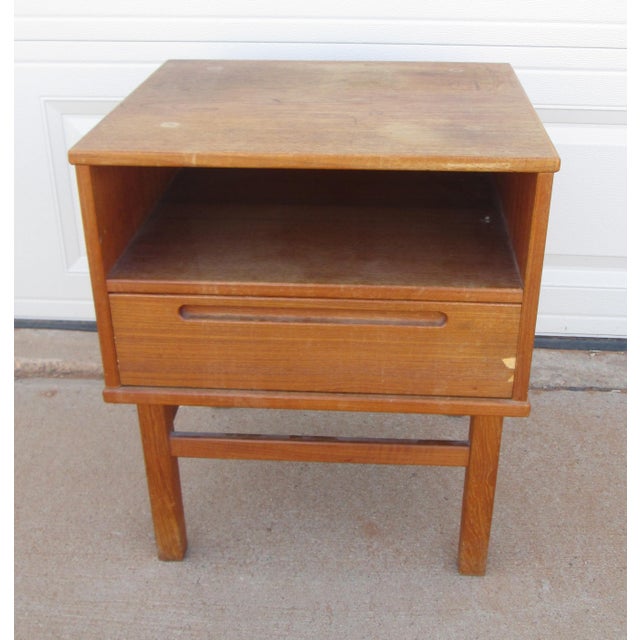 Vintage mid century modern / Danish modern teak / nightstand / end table by Nils Jonsson for HJN Mobler. The piece has a...