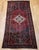 "This beautifully handwoven vintage Persian Hamadan area rug from the early to mid-20th century features a composition...