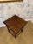 Such a lovely piece of history, this side table features distinctive barley twist legs and a delicate scalloped top. This...