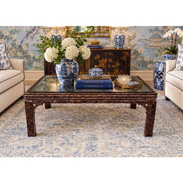 This beautiful vintage coffee table is very sturdy and nicely made. Faux burl finish almost has a tortoiseshell look. An...