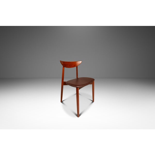 Introducing an incredibly rare set of Model 58 dining chairs in teak and leather upholstery designed by the influential...