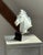 This expressive porcelain bust of a horse's head was designed in 1949 by the sculptor Erich Oehme (1889–1970) for the...