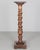 A late 19th Century French Louis XIII Revival barley twist column pedestal made of dark stained solid beech wood. Deep,...