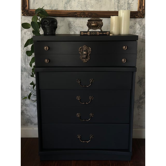 This Bassett highboy has been completely transformed into a dark romantic statement piece, the kind of dresser that makes...