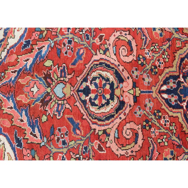 Red Large Persian Heriz Rug With Geometric Medallion in Rust, Yellow, Green and Blue For Sale - Image 8 of 12
