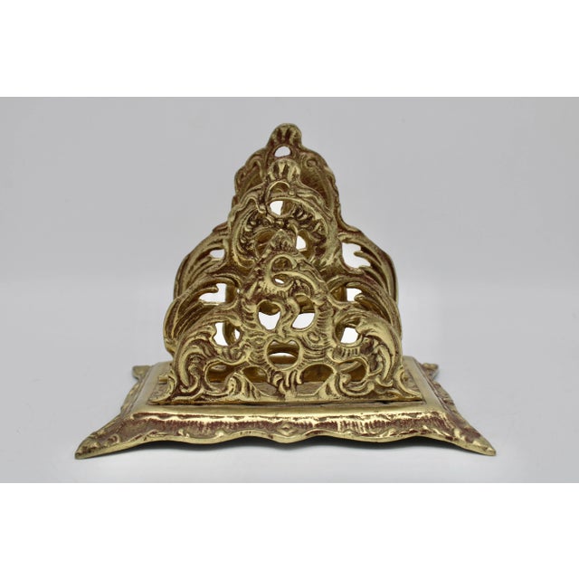 A superb Art Nouveau brass letter rack. This antique piece is so lovely. It holds a timeless elegance.