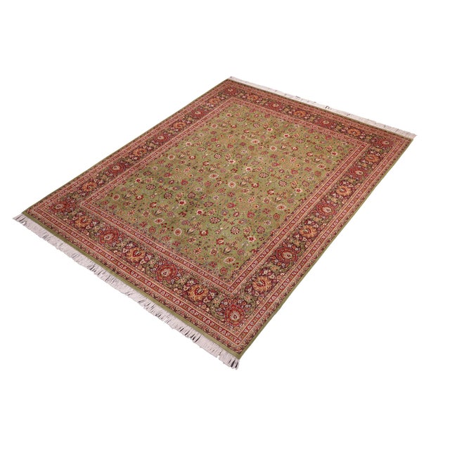 Designed with mesmerizing intricacy and gorgeous color palette, this hand-knotted masterpiece demonstrates the beauty and...