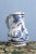 A late 18th-century French faience jug from Nevers, decorated with an elegant Chinoiserie decor in blue and white. with an...