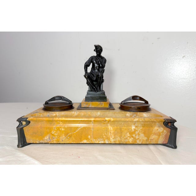 This Antique 19th century French desk inkwell features a solid siena marble base and a bronze statue of Lorenzo De...