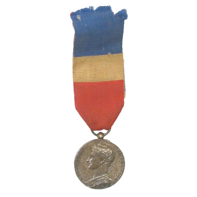 Collection of European medals assembled from antique markets in London, Brussels, and Paris. Includes a French WWI medal...