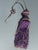 Small Antque furniture key with purple silk tassel.