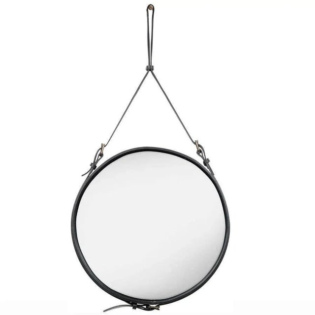 Jacques Adnet small Circulaire mirror with olive leather. Designed in 1950 by Jacques Adnet and executed in leather,...