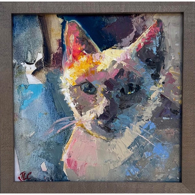 The artwork features a close-up depiction of a cat, rendered in vibrant oil hues that capture the animal's expressive...