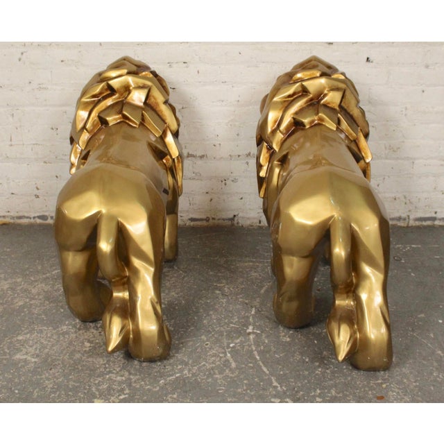 Gold painted lions from the DJ Khalid luxury home decor line. Each lion is given a sculpted and abstract geometric shape....