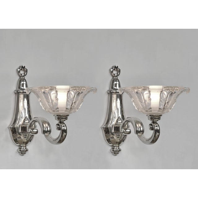Hubert Petitot & Jean Gauthier A pair of French art deco wall sconces in nickel plated copper alloy (bronze or solid...