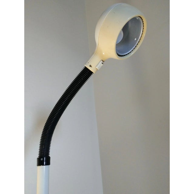 Floor lamp produced by the Swedish company Fagerhult in the 1960s. The lamp has a plastic diffuser that is movable due to...