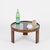 Gorgeous Mid-Century round tripod coffee table with smoked glass top. This elegant piece was produced by Molteni in Italy...