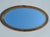 Oval Giltwood Mirror, Louis XVI Style Antique oval mirror with a giltwood and stucco frame, adorned with delicate floral...