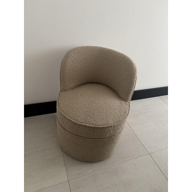 Pair of low armchairs restored and reupholstered.