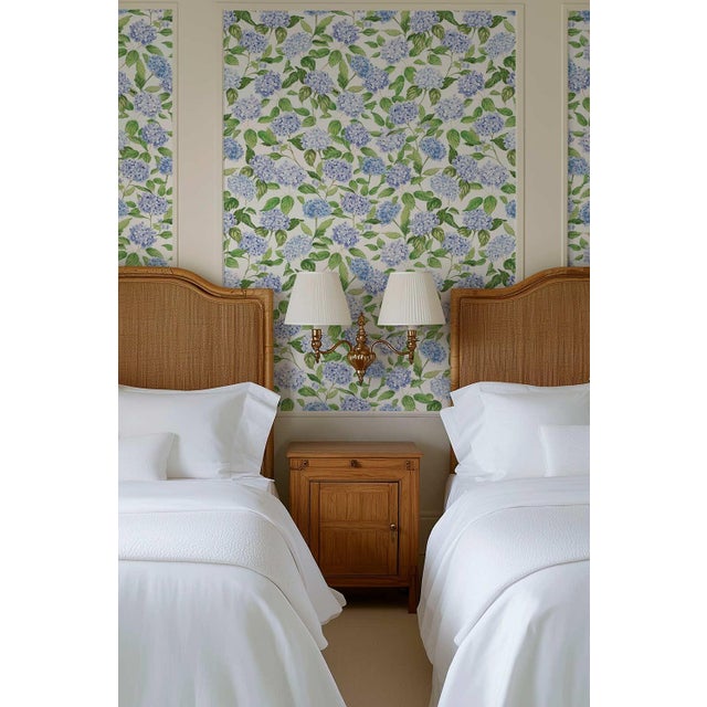 Our Hydrangea Blooms Botanical Wallpaper began as a hand-painted watercolor, with each petal added one by one to capture...