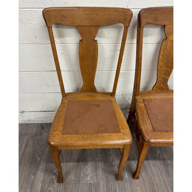 This is a beautiful pair of antique tiger oak Mission Arts and Crafts style dining chairs or occasional chairs with single...