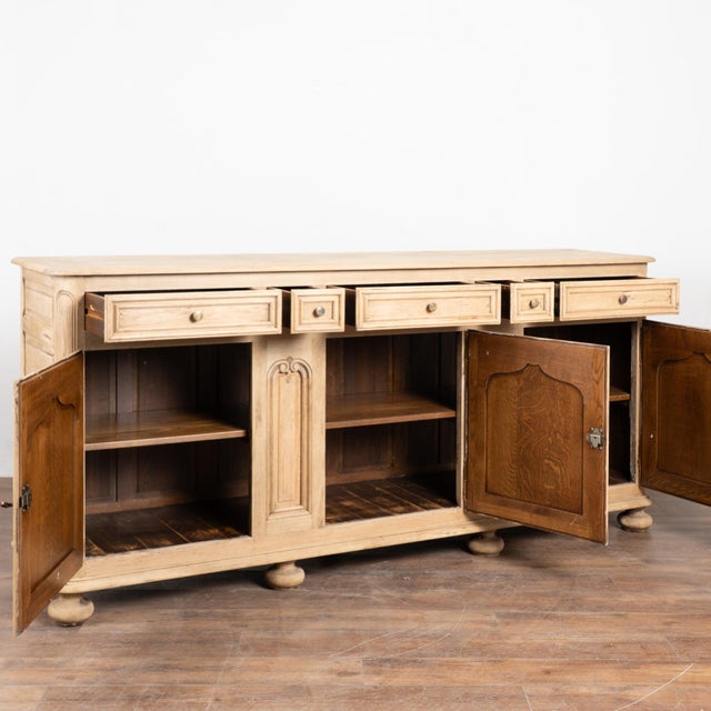 Late 19th-century French oak sideboard or buffet, bleached to create a lighter, softened finish well suited for modern...