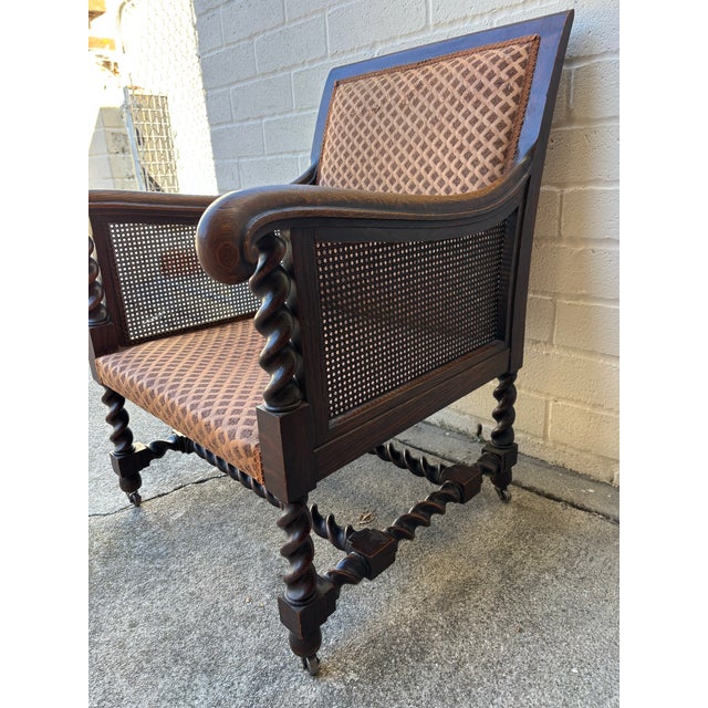 Antique Oak Bergere Armchair Featuring Barley Twist Legs, Arms, and Stretchers, With Cane Paneling Sides and Caster Wheels For Sale - Image 10 of 11